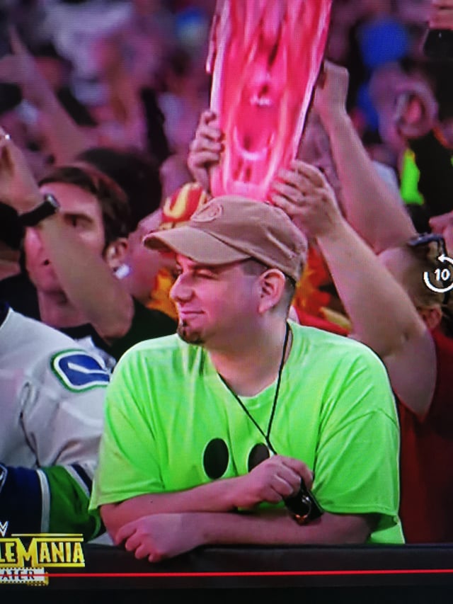 Who is the Green Shirt Guy in WWE? Uncover the Mystery Behind the Fan